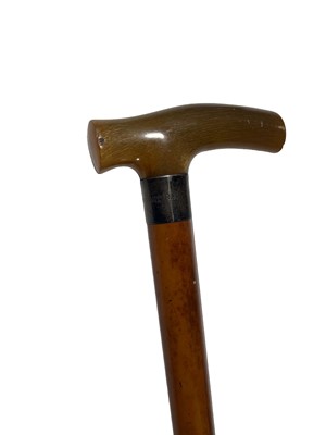 Lot 141 - A MALACCA WALKING CANE BY BRIGG