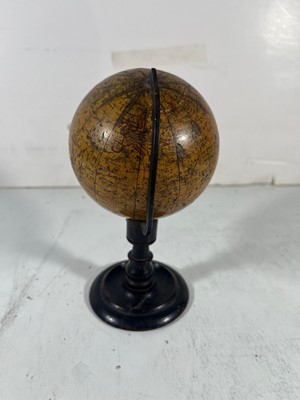 Lot 153 - A 4IN. TERRESTRIAL DESK GLOBE BY SMITH & SON, LONDON, 1867