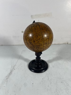 Lot 153 - A 4IN. TERRESTRIAL DESK GLOBE BY SMITH & SON, LONDON, 1867