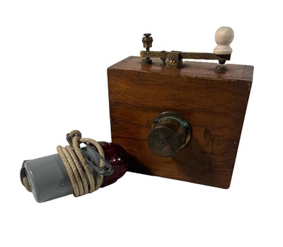 Lot 160 - A WOODEN BRASS MORSE LAMP FOR A YACHT, CIRCA 1920