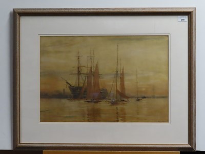 Lot 249 - WILLIAM LIONEL WYLLIE (BRITISH, 1851-1931) - The old 'St Vincent' anchored off Gosport with St. Nicholas' church tower behind