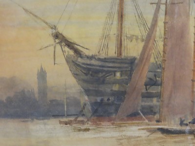 Lot 249 - WILLIAM LIONEL WYLLIE (BRITISH, 1851-1931) - The old 'St Vincent' anchored off Gosport with St. Nicholas' church tower behind