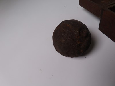 Lot 42 - CANNON BALL UNDERSTOOD TO BE FROM THE WRECK OF THE H.C.S. 'ADMIRAL GARDINER', 1809