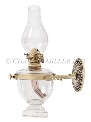 Lot 63 - A LARGE BRASS AND GLASS BULKHEAD OIL LAMP, CIRCA 1900