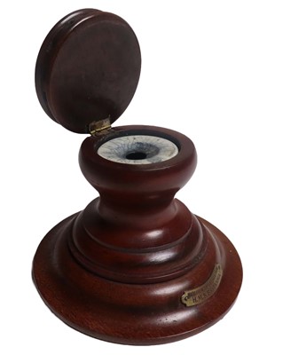 Lot 29 - AN INKWELL MADE FROM H.M.S. 'BRITANNIA' TREEN