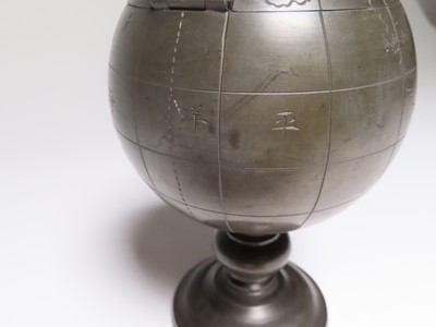 Lot 1 - A CHINESE PEWTER TOBACCO JAR MODELLED AS A GLOBE, CIRCA 1930