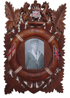 Lot 26 - NAVAL PHOTOGRAPH FRAME IN MEMORY OF A SEAMAN OF H.M.S. 'BERWICK', EARLY 20TH CENTURY