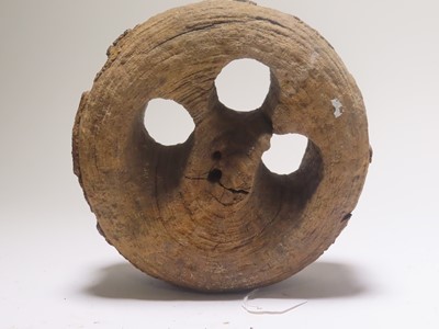 Lot 19 - A DEADEYE RECOVERED FROM H.M.S. 'RAMILLIES' (EX-'KATHERINE' 1664, EX-'ROYAL KATHERINE' 1696) WRECKED 1760