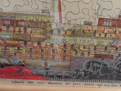 Lot 68 - A FRAMED JIGSAW OF R.M.S. 'AQUITANIA', 1914