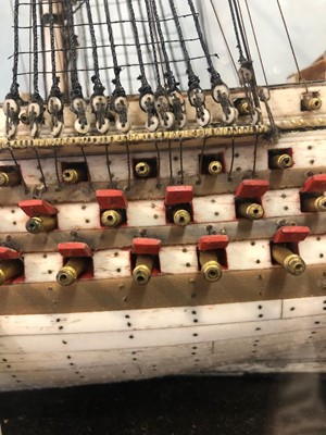 Lot 160 - A EARLY 19TH CENTURY FRENCH NAPOLEONIC PRISONER-OF-WAR BONE SHIP MODEL