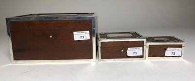Lot 73 - SILVER-MOUNTED CIGAR AND CIGARETTE BOXES MADE FROM WOOD RECOVERED FROM THE S.S. 'FUKUI MARU' (EX-'ABERGELDIE'), AFTER SHE WAS SUNK AS A BLOCKSHIP AT PORT ARTHUR DURING THE RUSSO-JAPANESE WAR OF 1904