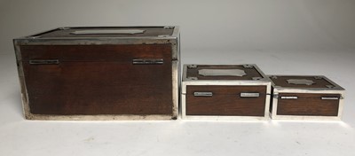 Lot 73 - SILVER-MOUNTED CIGAR AND CIGARETTE BOXES MADE FROM WOOD RECOVERED FROM THE S.S. 'FUKUI MARU' (EX-'ABERGELDIE'), AFTER SHE WAS SUNK AS A BLOCKSHIP AT PORT ARTHUR DURING THE RUSSO-JAPANESE WAR OF 1904