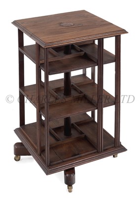 Lot 172 - A REVOLVING LIBRARY BOOKCASE MADE FROM TIMBER RECOVERED FROM THE 'FOUDROYANT'