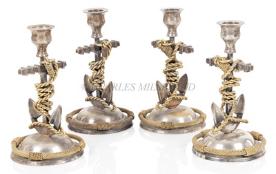 Lot 278 - A SET OF FOUR MARINE-THEMED CANDLESTICKS