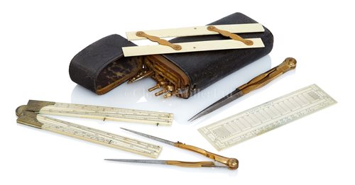 Lot 245 - Ø A BRASS AND IVORY DRAWING ETUI BY GEORGE...