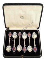 Lot 159 - A SET OF SILVER AND ENAMEL TEASPOONS FROM...