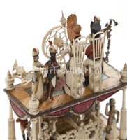 Lot 102 - AN EXCEPTIONAL NINE-CHARACTER POLYCHROME BONE...