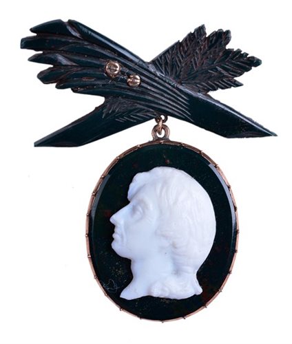Lot 90 - A BLOODSTONE AND WHITE GLASS CAMEO...