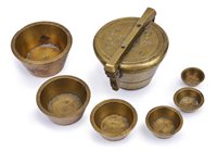 Lot 272 - A NEST OF BRASS CONTINENTAL CUP WEIGHTS, CIRCA...