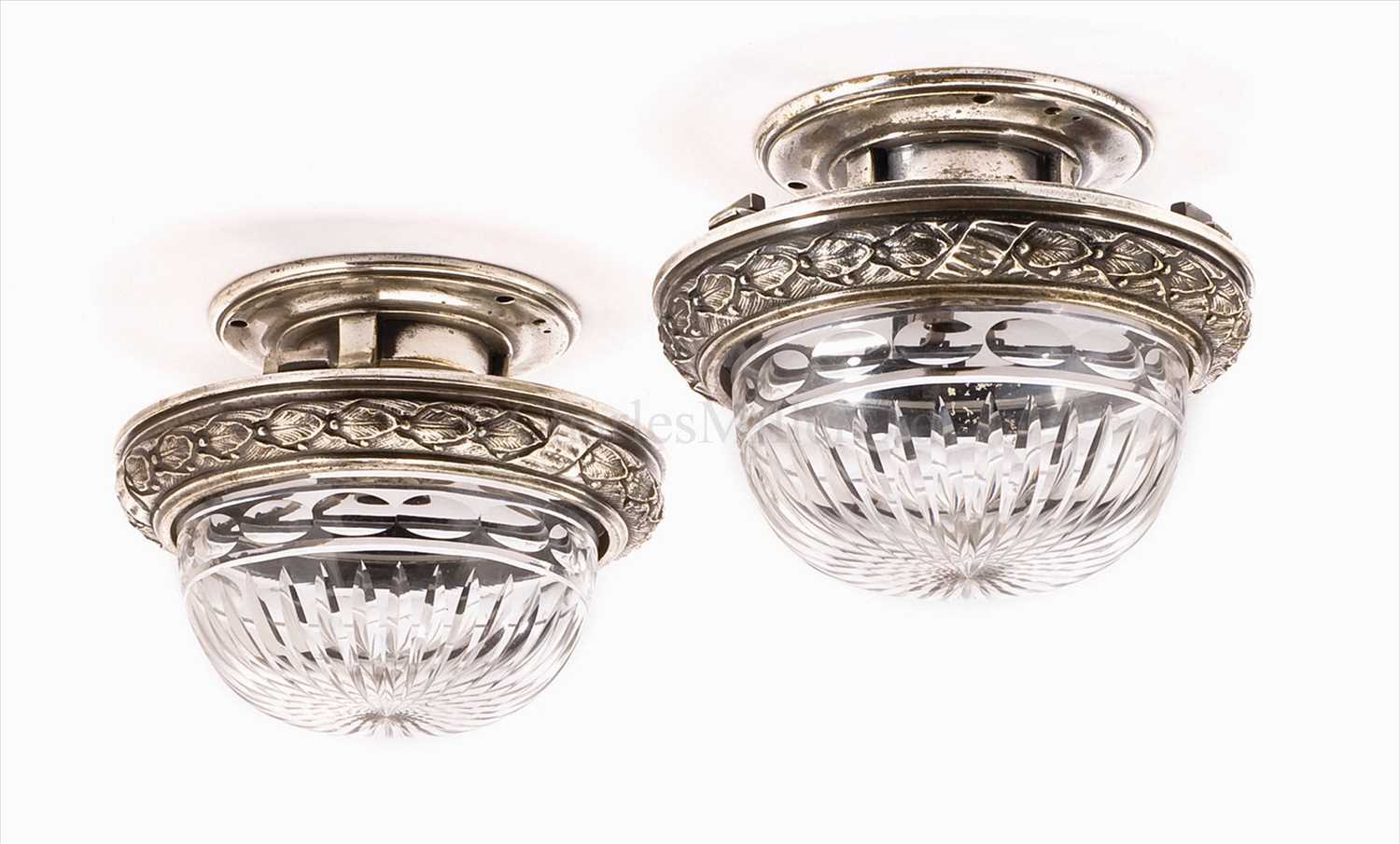 Lot 46 - A pair of nickel-plated brass cut-glass...