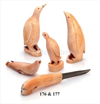 Lot 177 - A MARINE IVORY ESKIMO KNIFE<br/>the handle carved...