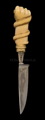 Lot 85 - A CARVED MARINE IVORY CANE HANDLE<br/><br/>in the form...