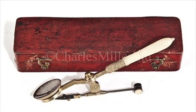 Lot 201 - AN EARLY 19TH-CENTURY IVORY AND BRASS POCKET...