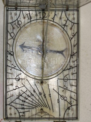 Lot 158 - AN IVORY NUREMBERG POCKET DIPTYCH SUNDIAL BY...