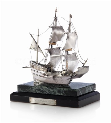 Lot 126 - A SMALL SILVER MODEL OF THE MAYFLOWER<br/>depicted...