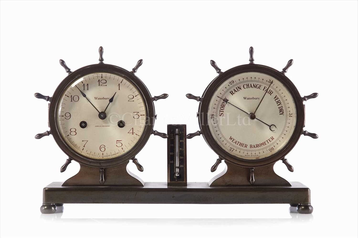 Lot 162 - A TWIN CLOCK AND ANEROID BAROMETER DESK SET BY...